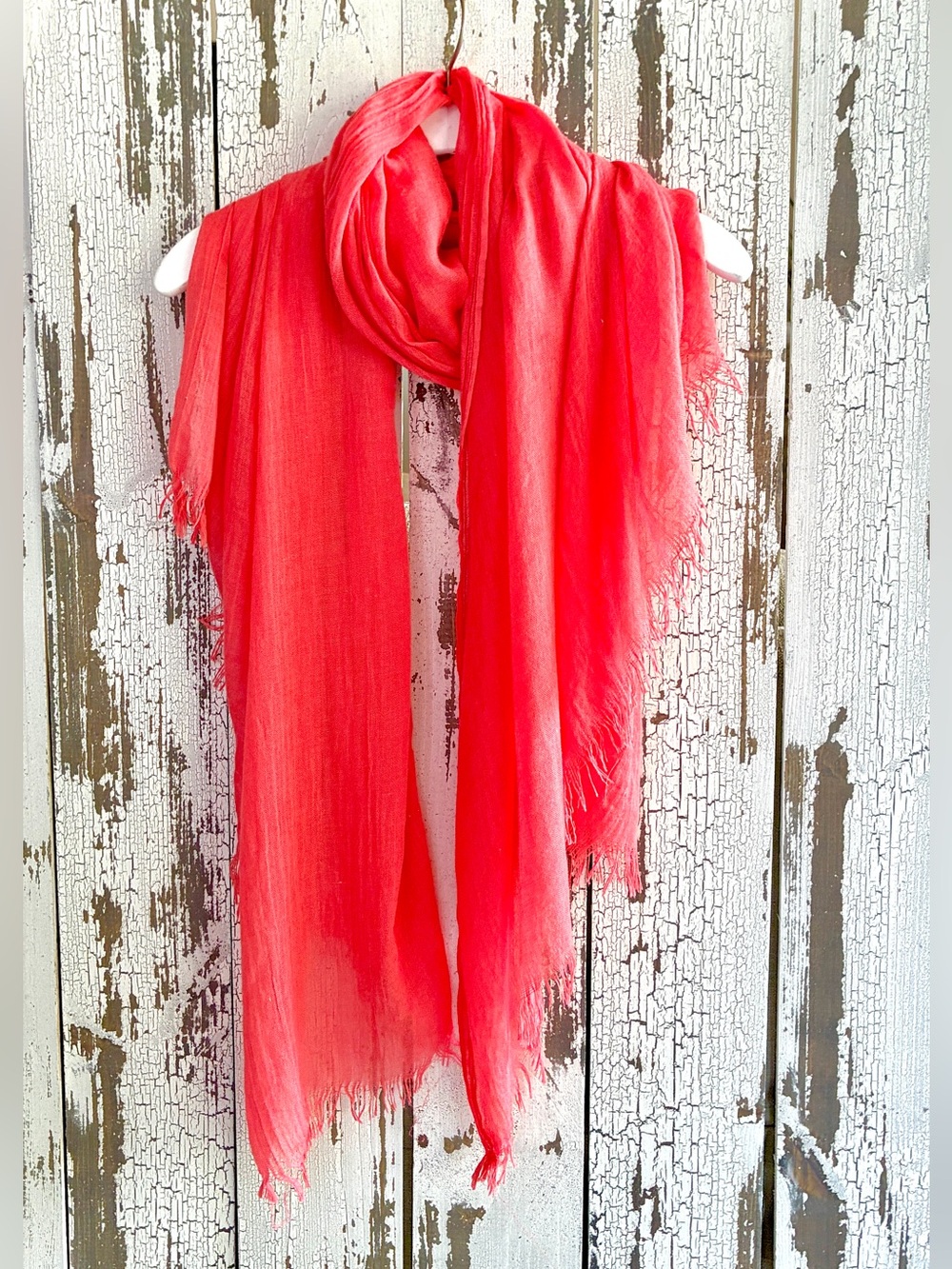 Beautiful oversized coral scarf wrap with fringe detailing at both ends